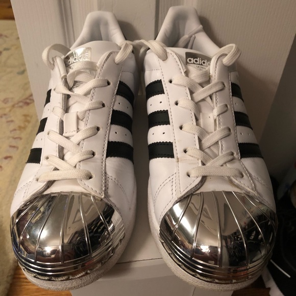 white superstar with silver toe